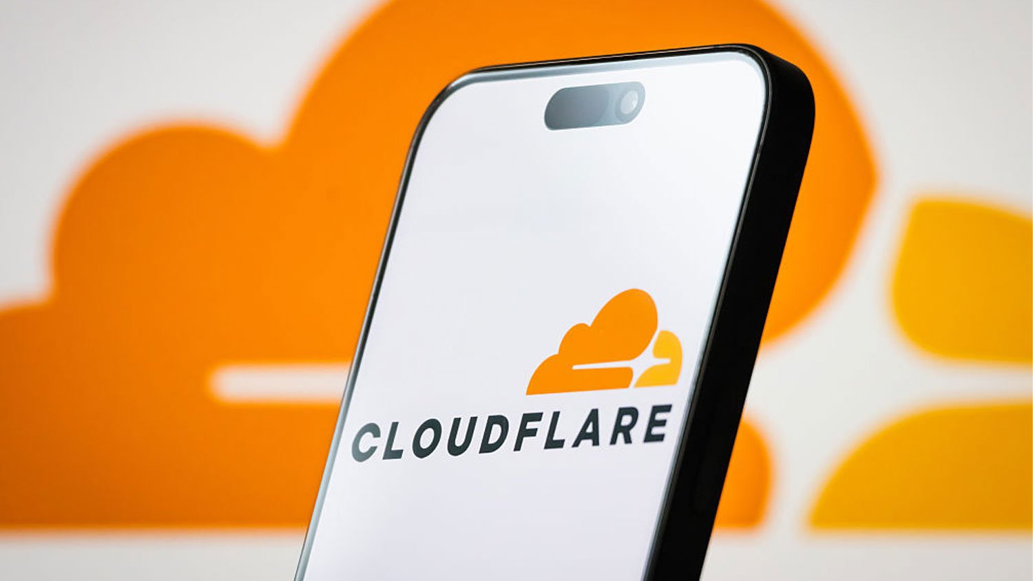 A mobile phone displaying the cloudflare logo